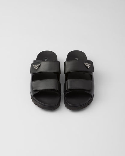 PRADA
Black Leather Slides