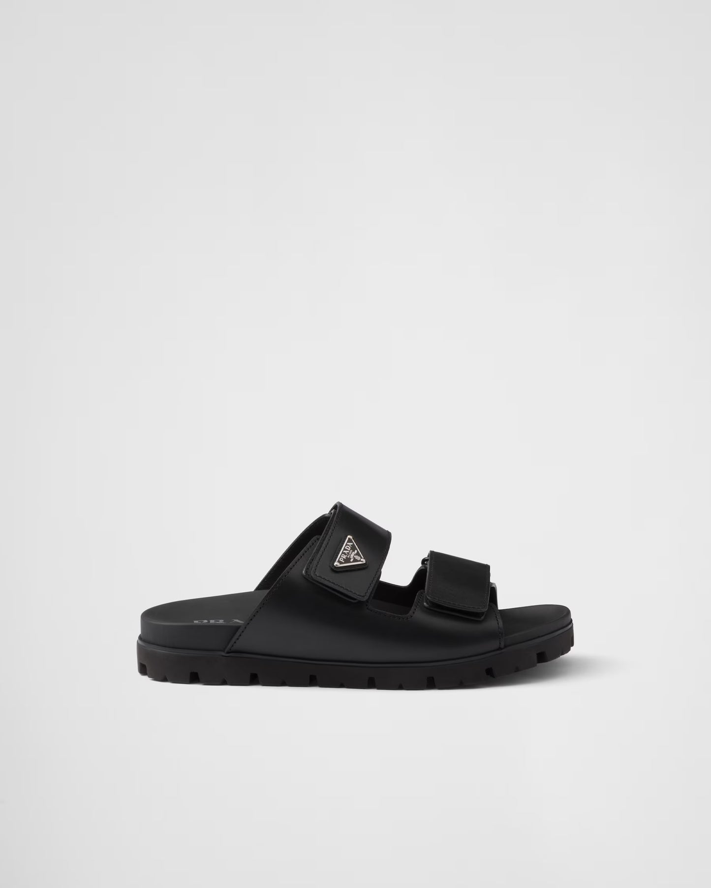 PRADA
Black Leather Slides