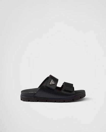 PRADA
Black Leather Slides