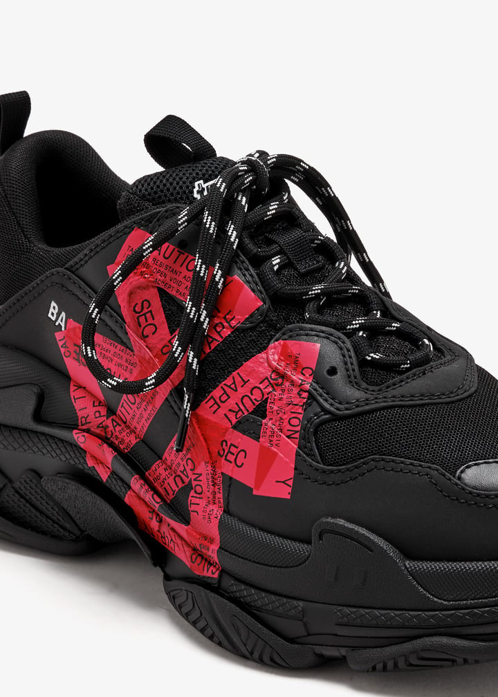 BALENCIAGA
Triple S tape sneakers