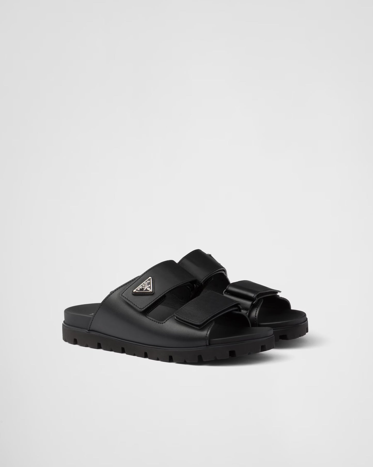 PRADA
Black Leather Slides