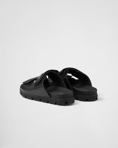 PRADA
Black Leather Slides